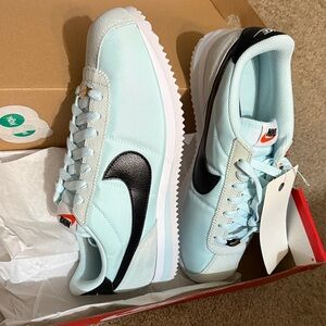 Nike Sky Blue Sneakers with Black Logo